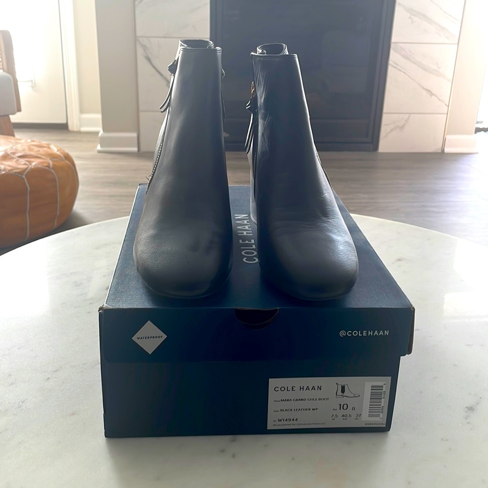 Cole Haan black leather zip booties. Brand new, never worn